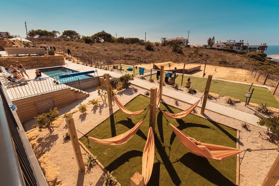 Hotel Ericeira Portugal nomad remote 8889d41d-7bf4-40ac-a17a-c65713d0c5d8_NS- Aktion Ericeira Outdoor hammocks.jpg